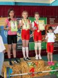 У Маріуполі стартував перший турнір з важкої атлетики на честь Юлії Каліни та Артема Удачина